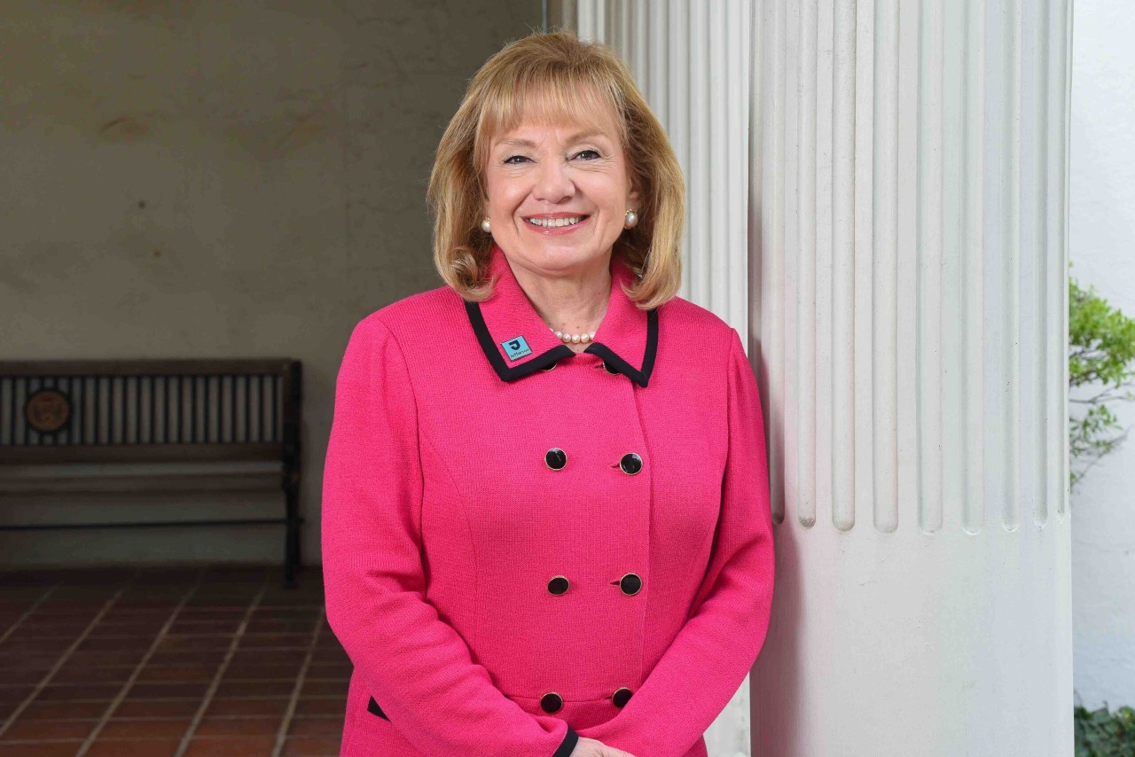 Dr. Aldridge in front of Reichlin