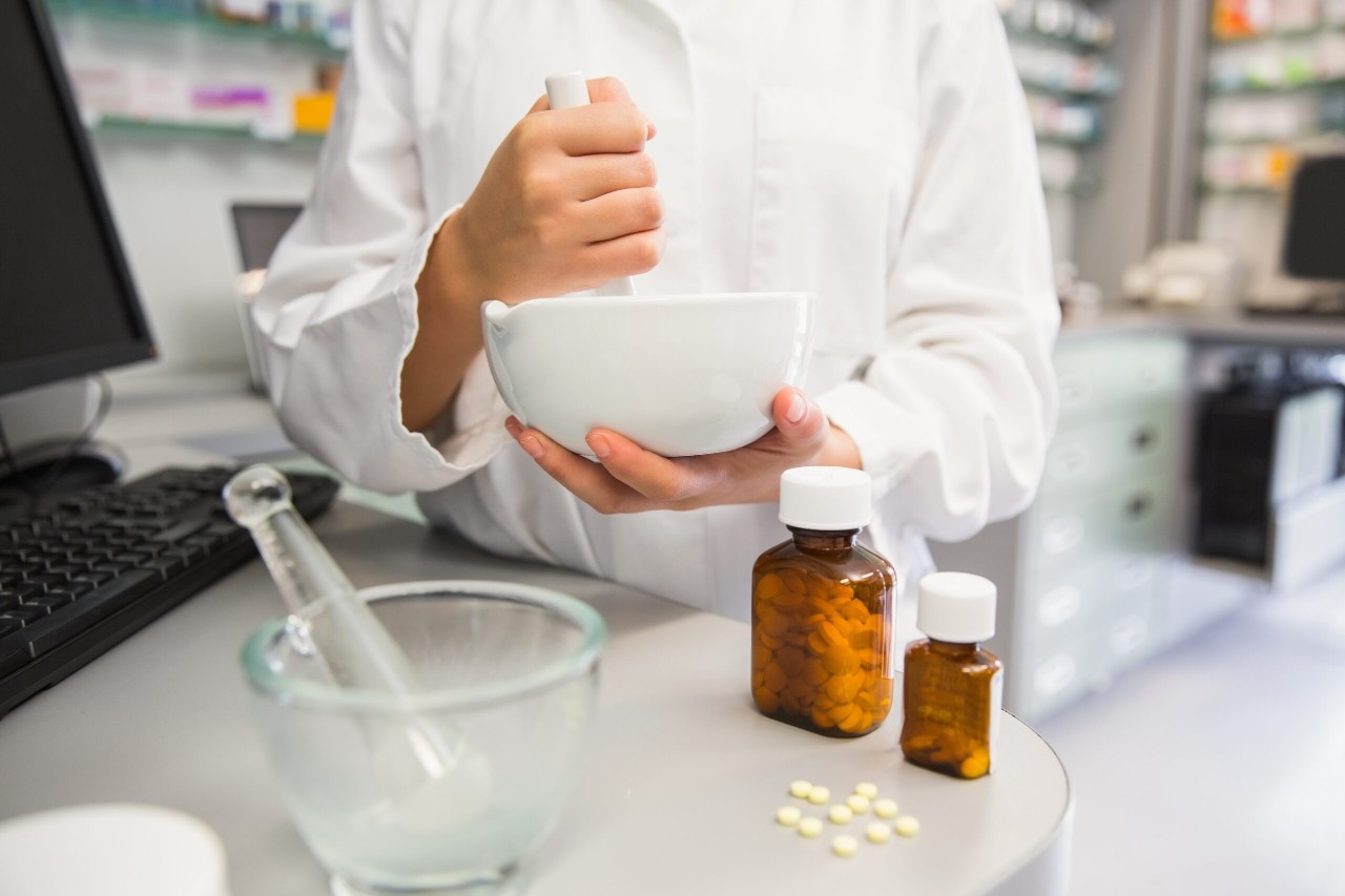 Pharmacist mixing a medicine