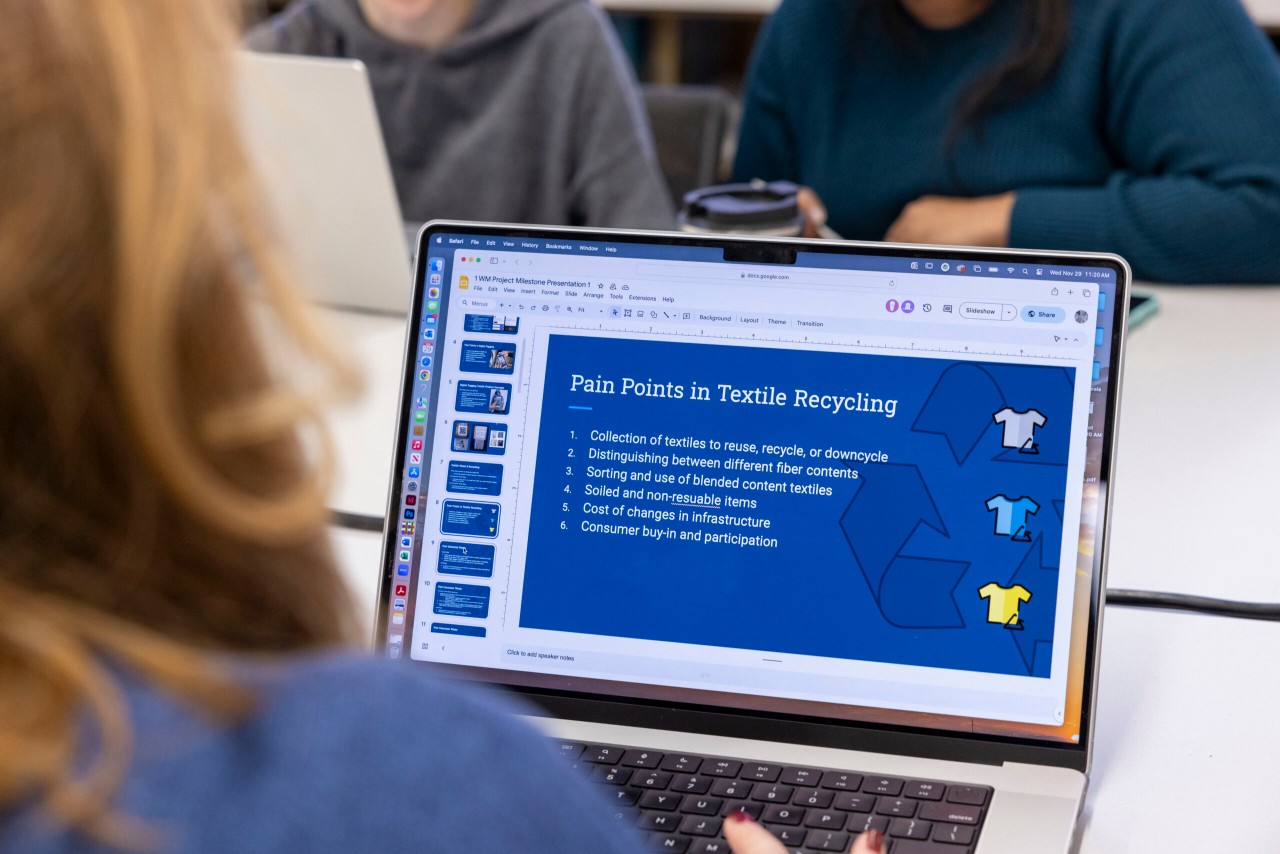 close up of a computer screen describing the issues of textile recycling