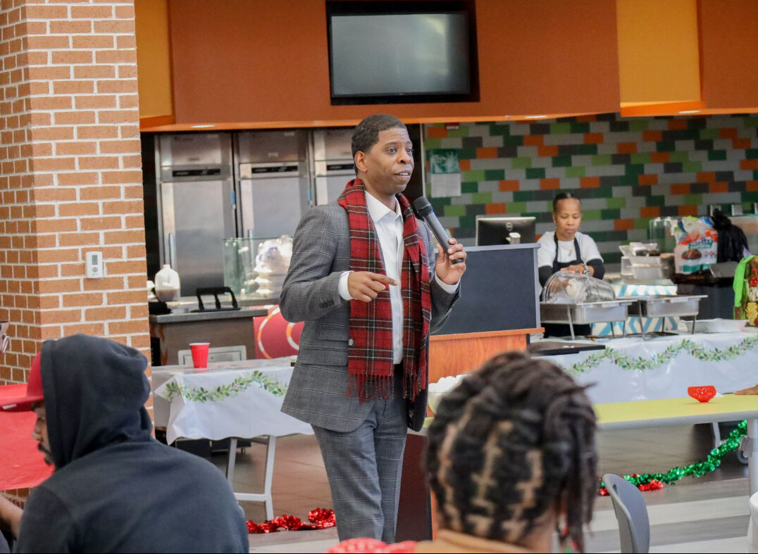 Dr. Myles speaking at an event.