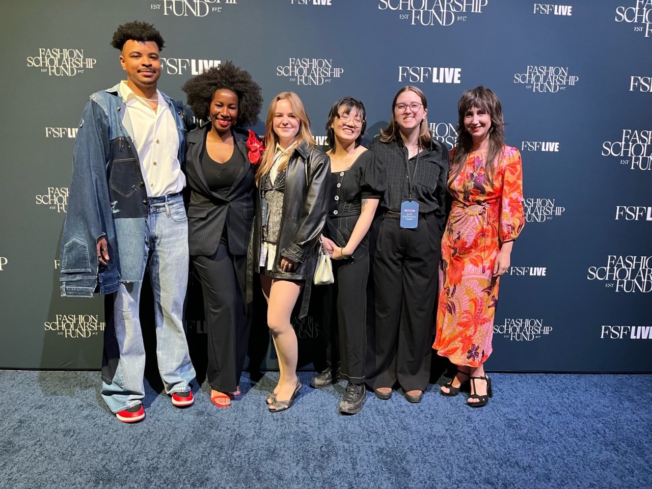 Fashion scholarship winners and faculty at the gala