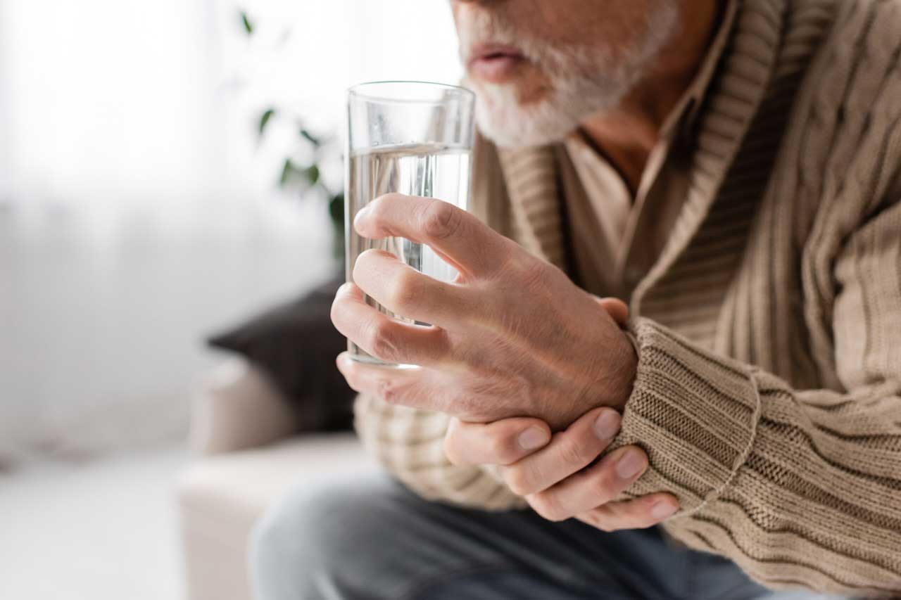 Nexus man with a glass of water