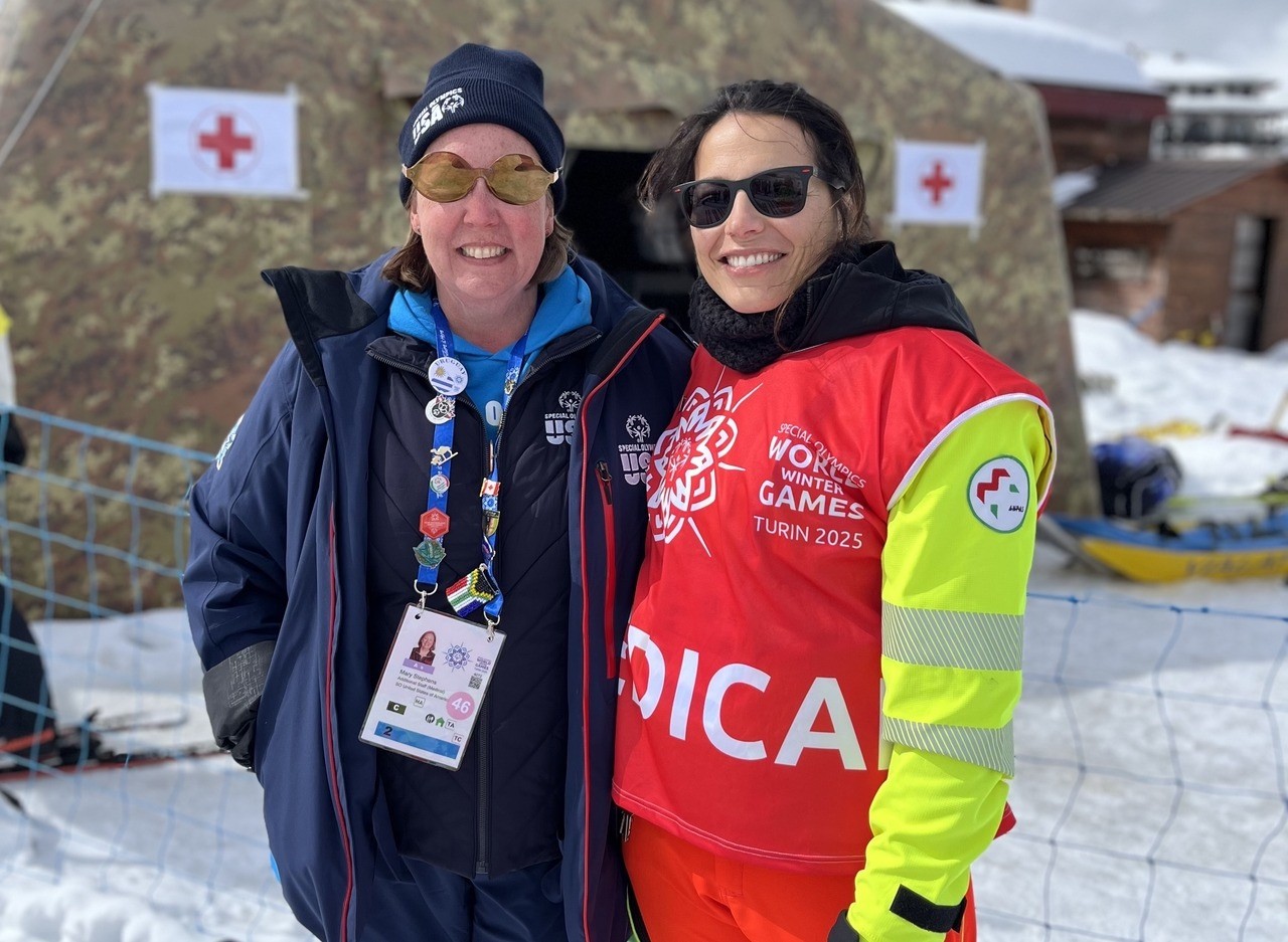 “Special Olympics does wonderful work worldwide to foster inclusion and inclusive healthcare,” says Dr. Mary Stephens, pictured left with a paramedic. 