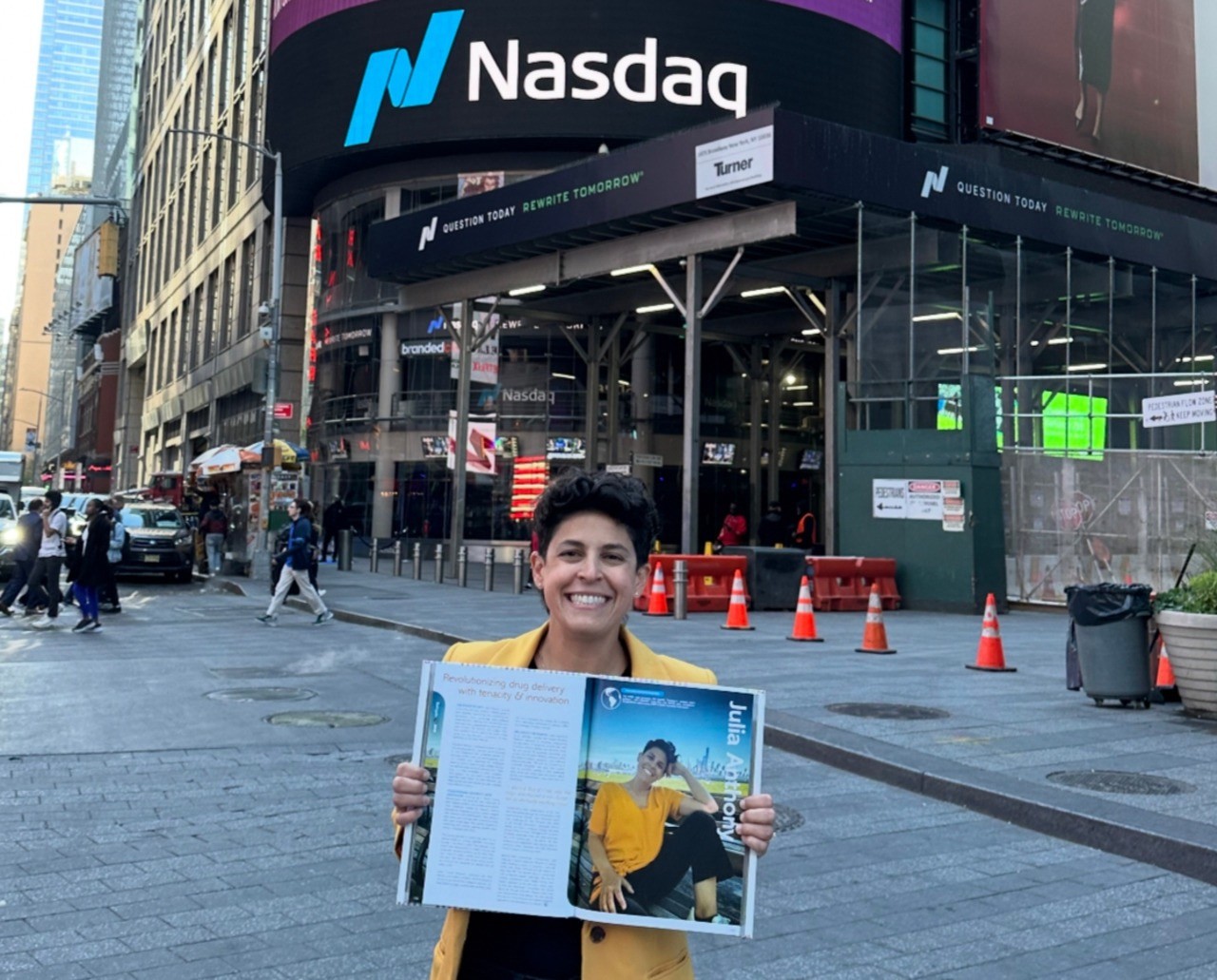 In 2024, Julia Anthony was named a Gaingels 100 Entrepreneur, which recognizes LGBTQIA+ venture-backed entrepreneurs. Here, Anthony holds the book honoring the distinction.