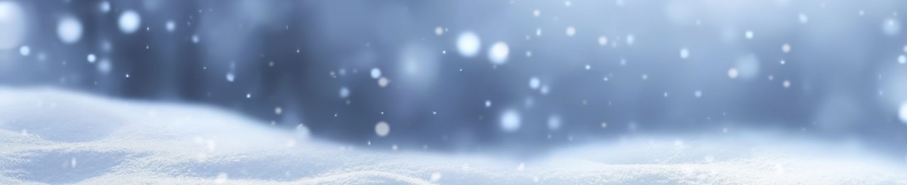 Winter snow background with snowdrifts, with beautiful light and snow flakes on the blue sky in the evening, banner format, copy space.